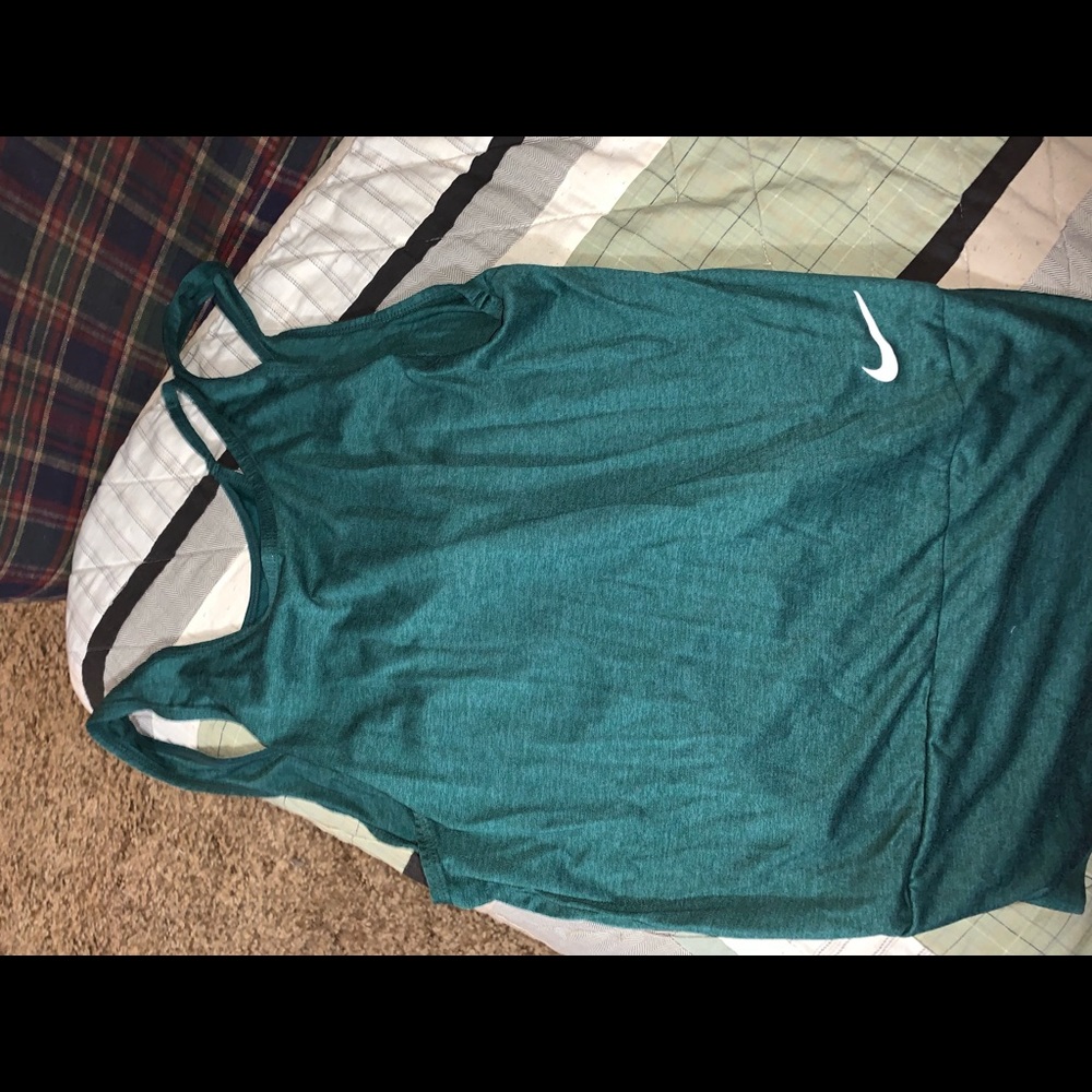 Teal Nike dry fit razor back tank. Size small